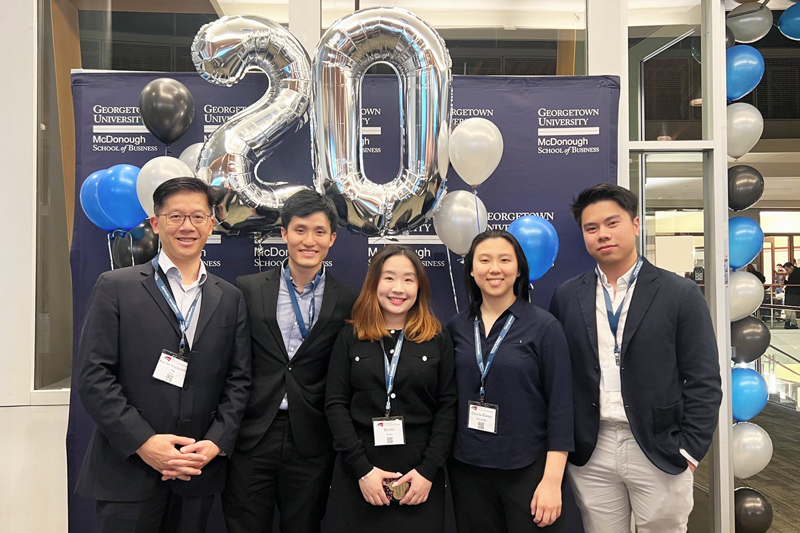 (From left) Professor Jonathan Ng Tai-sing, the team’s coach, and the four award-winning students from CB, Harry Noh Hyunin, Gloria Andry Putri, Gisela Gwen Michelle and Richard Ponto.